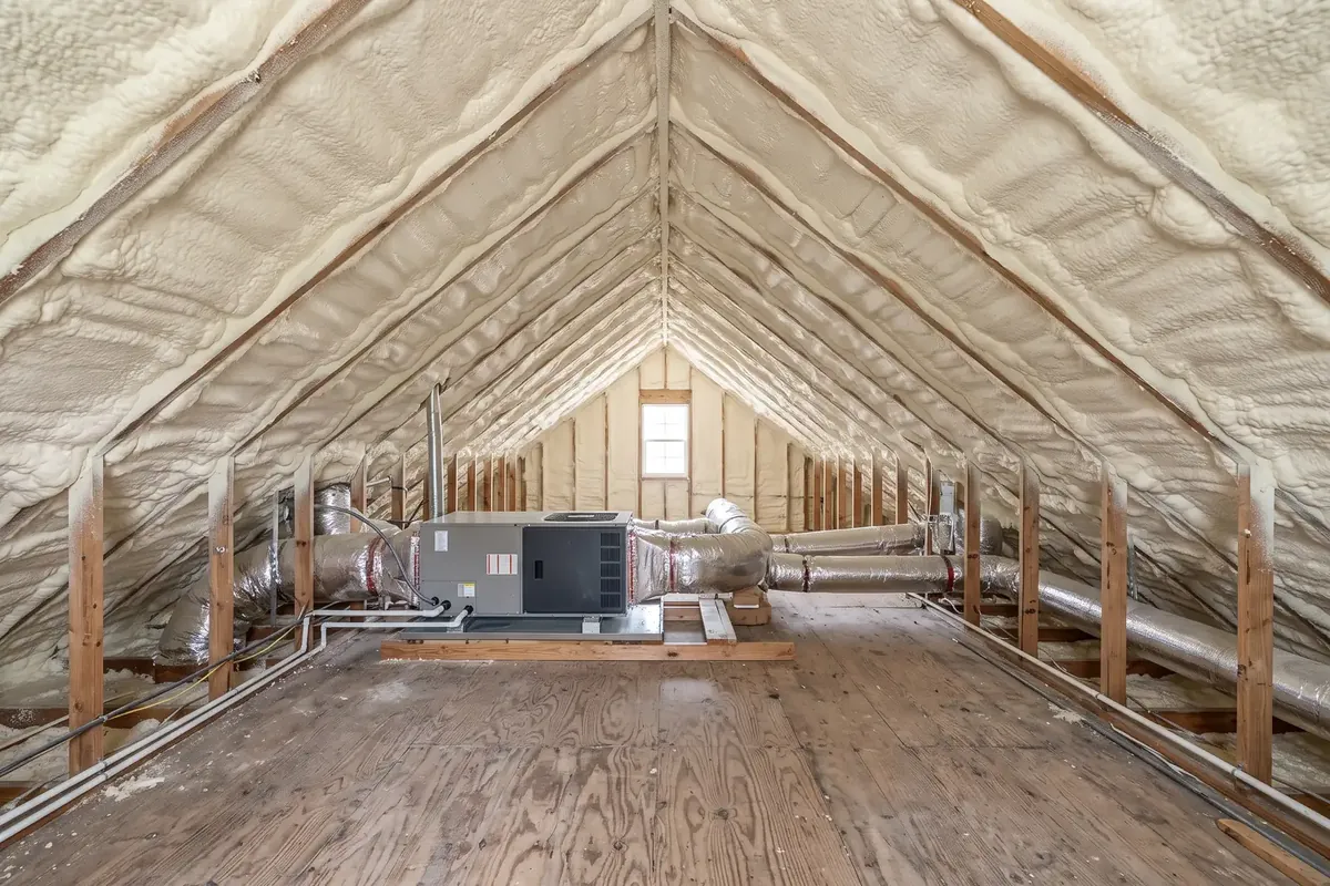 Fully encapsulated attic with open-cell spray foam in a Metairie home